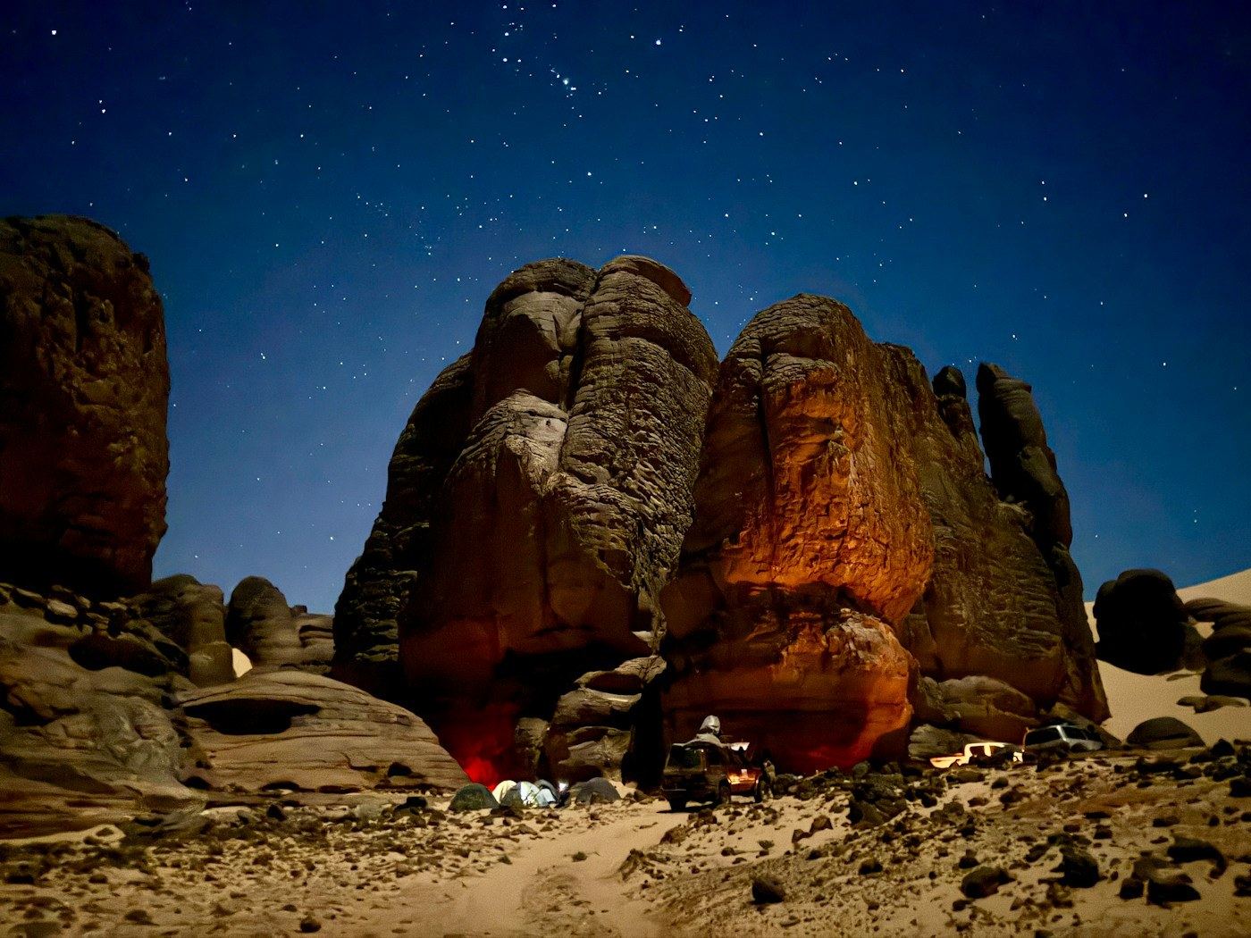 A remote campsite set among granite boulders in Damaraland at sunset